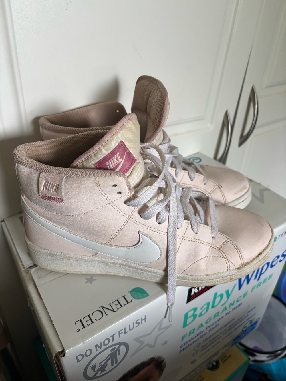 Nike Women's Mid-Top Sneakers in Pale Pink and White